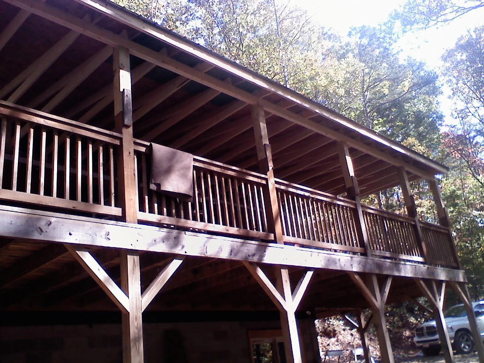 Timber framing under a new elevated porch and deck — Roof Leak Repair in Willard by Roofing Brothers